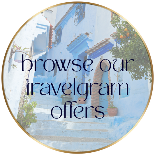blue Moroccan village background with text overlay, inviting you to browse our travelgram offers at Glow Well Travel